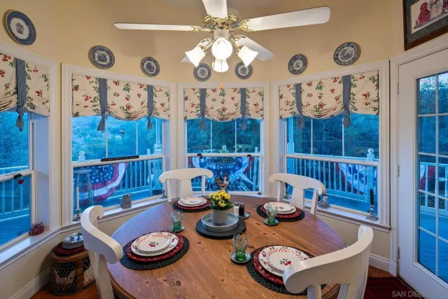 a kitchen with stainless steel appliances granite countertop a stove and a refrigerator