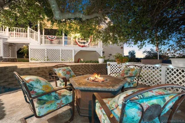 a room with musical instruments pool table and windows