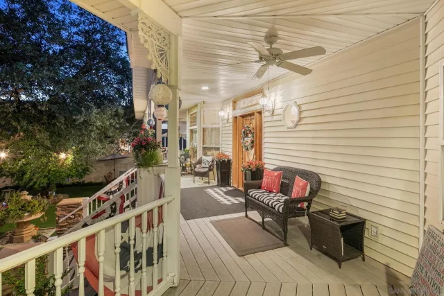 a view of a dining room that has a table and chairs in it