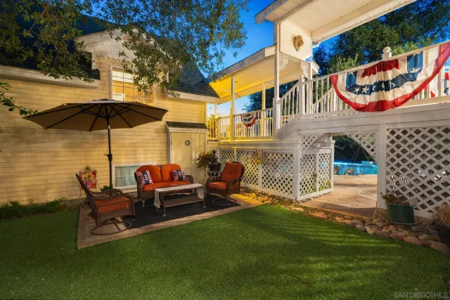 a bathroom with a toilet a sink and a mirror