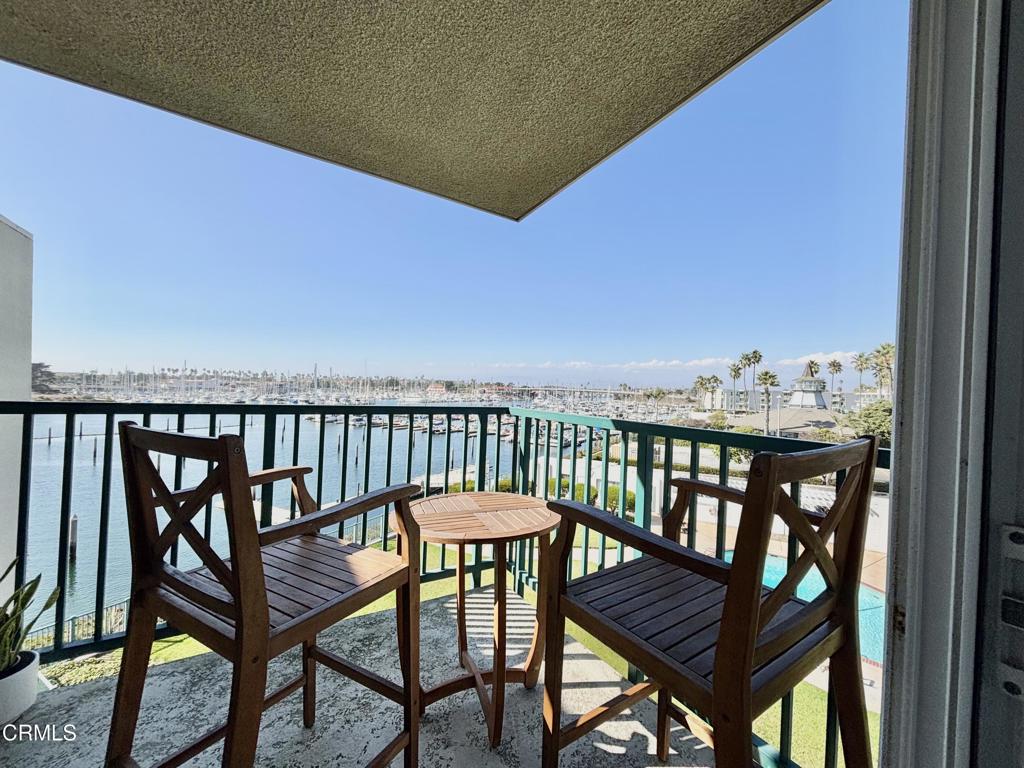 3101 Peninsula Road, Unit 312 Oxnard, CA 93035 - Photo 26 of 38 a view of a balcony with chairs