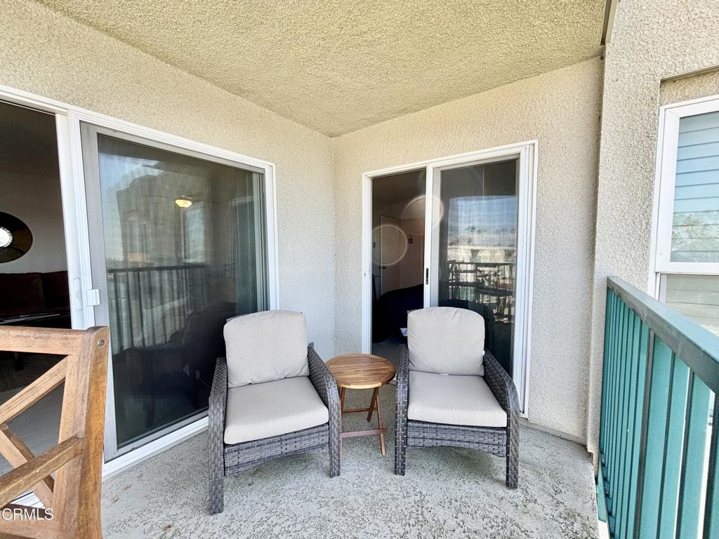 3101 Peninsula Road, Unit 312 Oxnard, CA 93035 - Photo 29 of 38 a room with furniture and windows