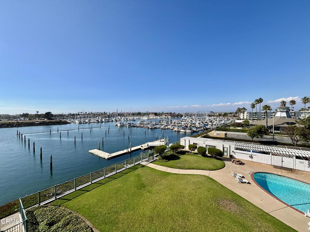 3101 Peninsula Road, Unit 312 Oxnard, CA 93035 - Photo 32 of 38 a view of a swimming pool with a terrace