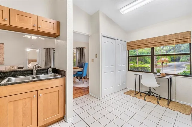 a living room with granite countertop furniture and a window