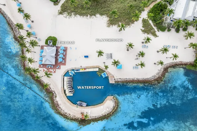 a very nice looking living room with furniture and a large window