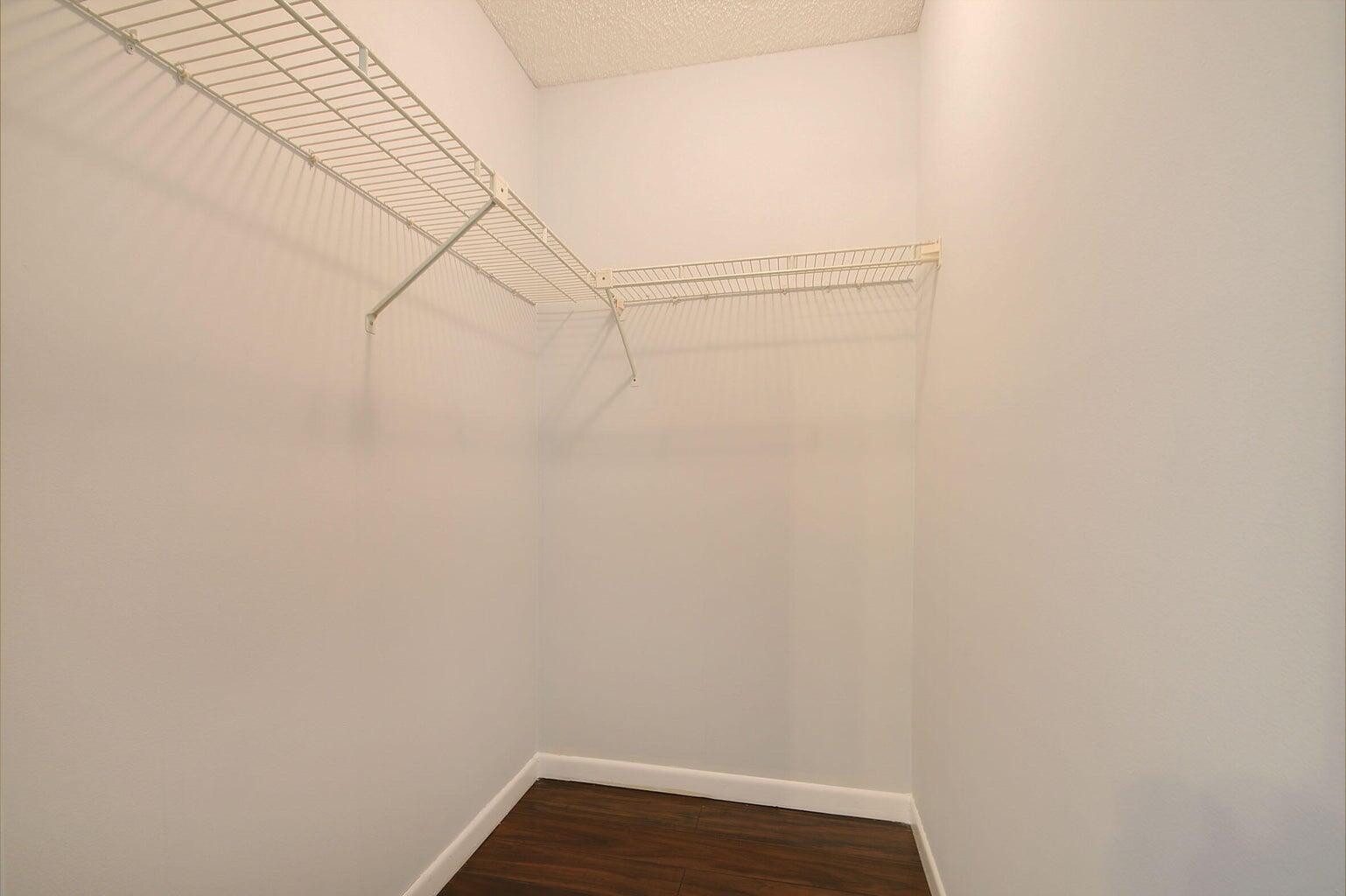 4844 Sable Pine Circle, Unit D2 West Palm Beach, FL 33417 - Photo 25 of 45 a view of small space with empty racks