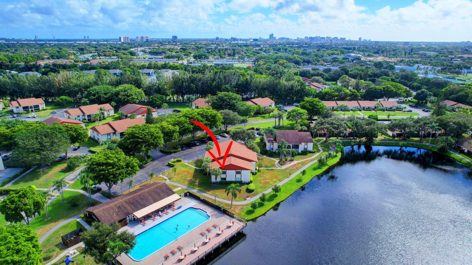 4844 Sable Pine Circle, Unit D2 West Palm Beach, FL 33417 - Photo 37 of 45 an aerial view of a city