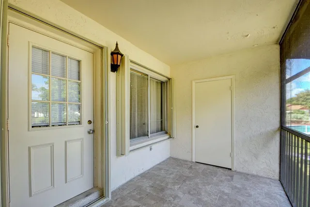 an entryway with a glass door