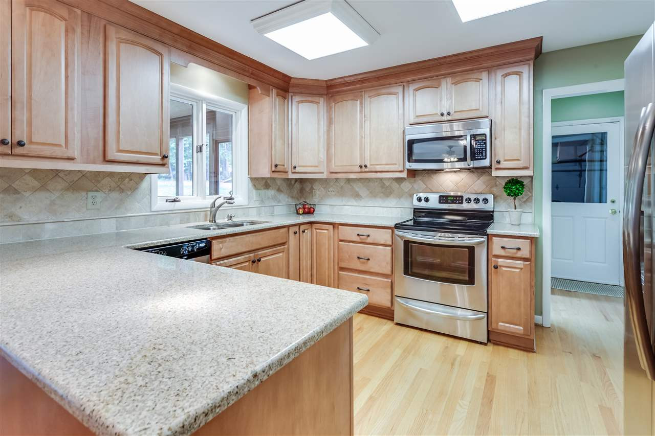 8833 Woodyhill Road Raleigh, NC 27613 - Photo 18 of 25 Kitchen