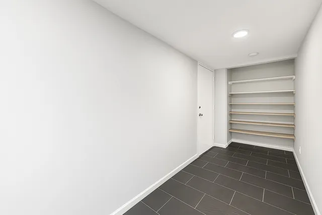 a view of a room with a bench