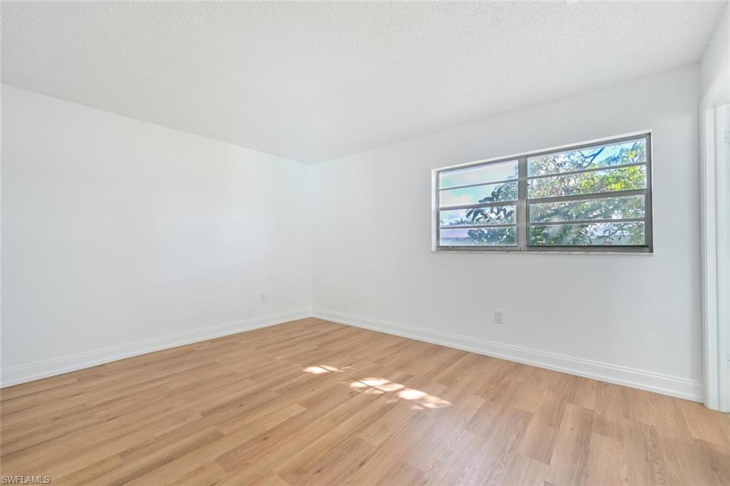 4666 Dorando Drive Naples, FL 34103 - Photo 16 of 30 wooden floor in a room