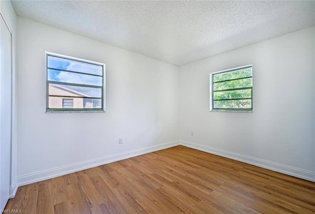 4666 Dorando Drive Naples, FL 34103 - Photo 23 of 30 an empty room with a window