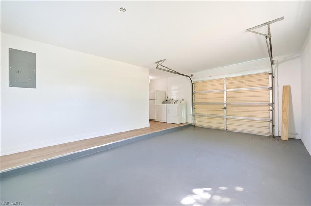 4666 Dorando Drive Naples, FL 34103 - Photo 26 of 30 a view of a room with closet and racks