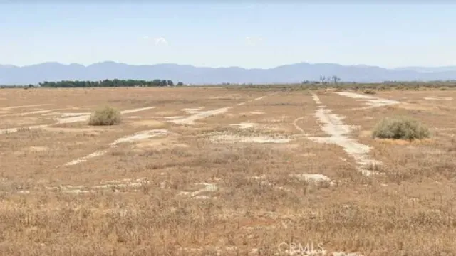 a view of lake with mountain