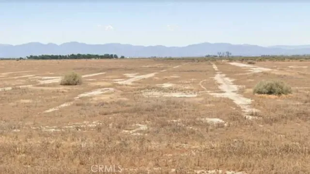 a view of lake with mountain
