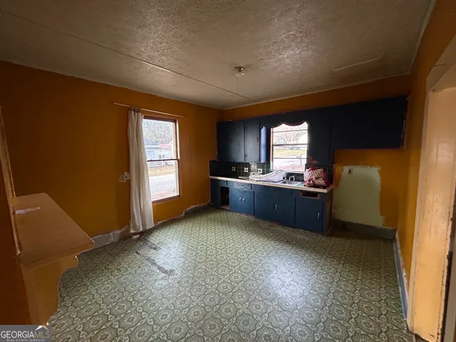 a view of kitchen and window