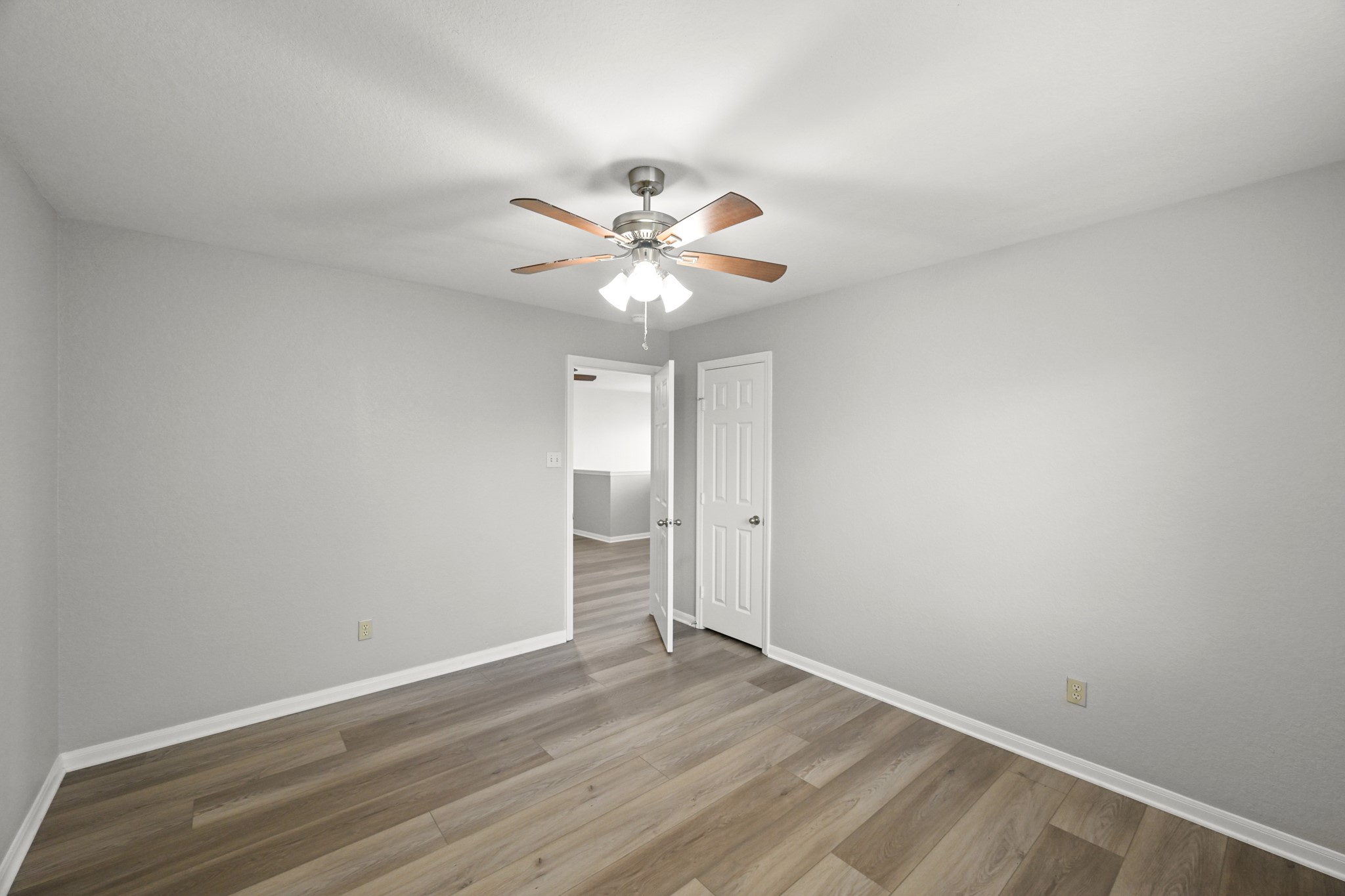 14614 Hazy Ridge Lane Cypress, TX 77429 - Photo 30 of 36 wooden floor in an empty room