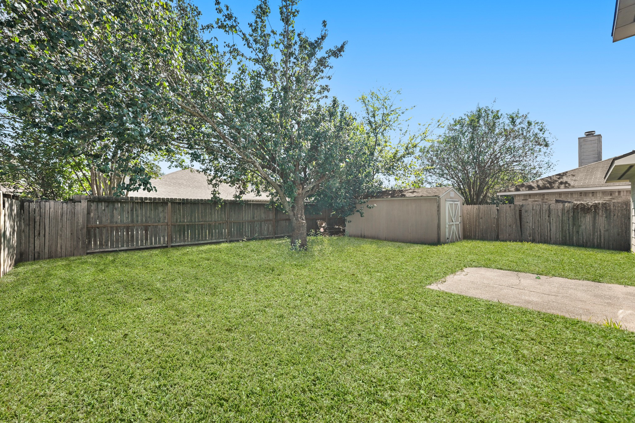 14614 Hazy Ridge Lane Cypress, TX 77429 - Photo 35 of 36 a view of a backyard with green space