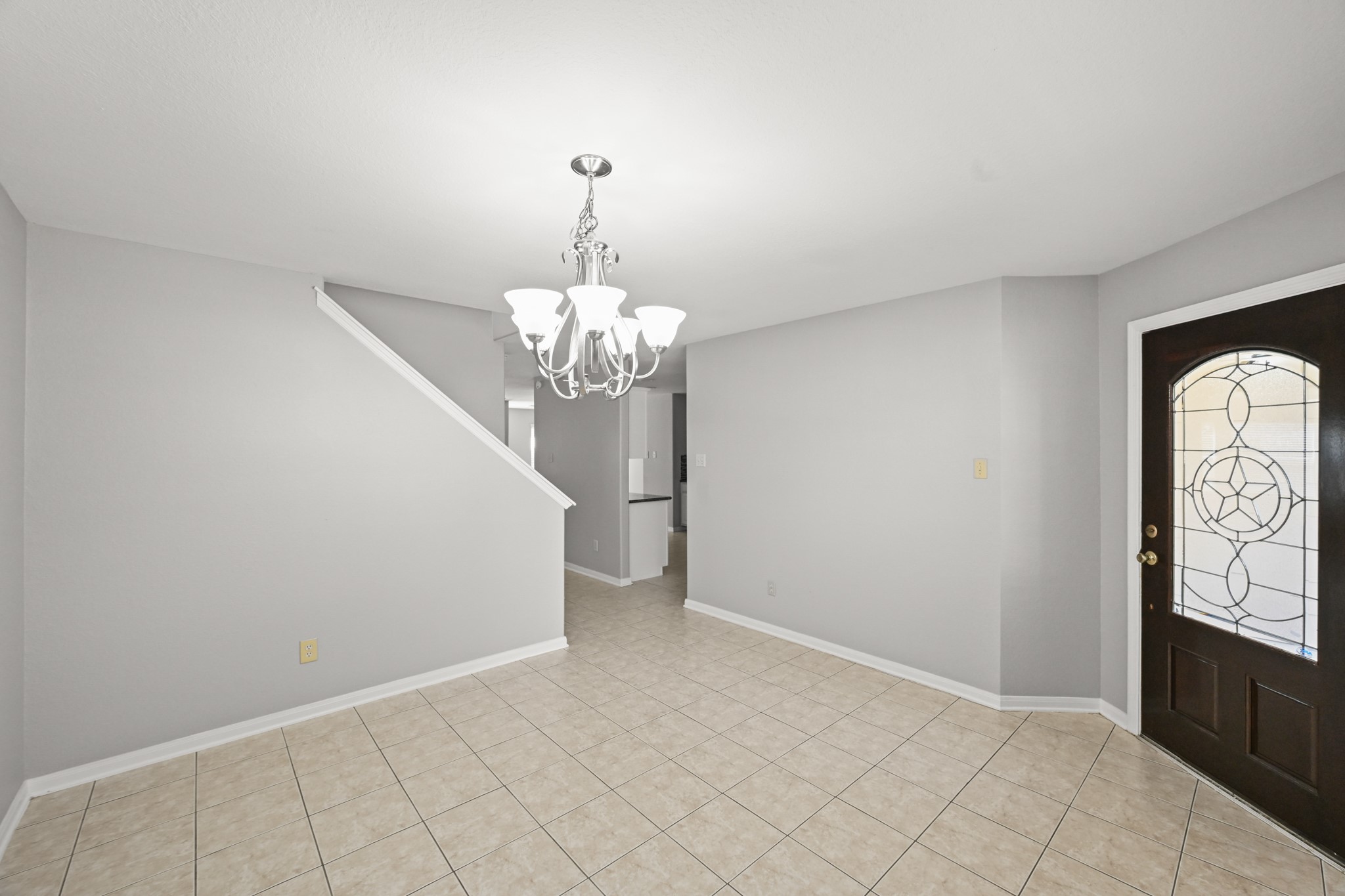 14614 Hazy Ridge Lane Cypress, TX 77429 - Photo 6 of 36 a view of a livingroom with a chandelier