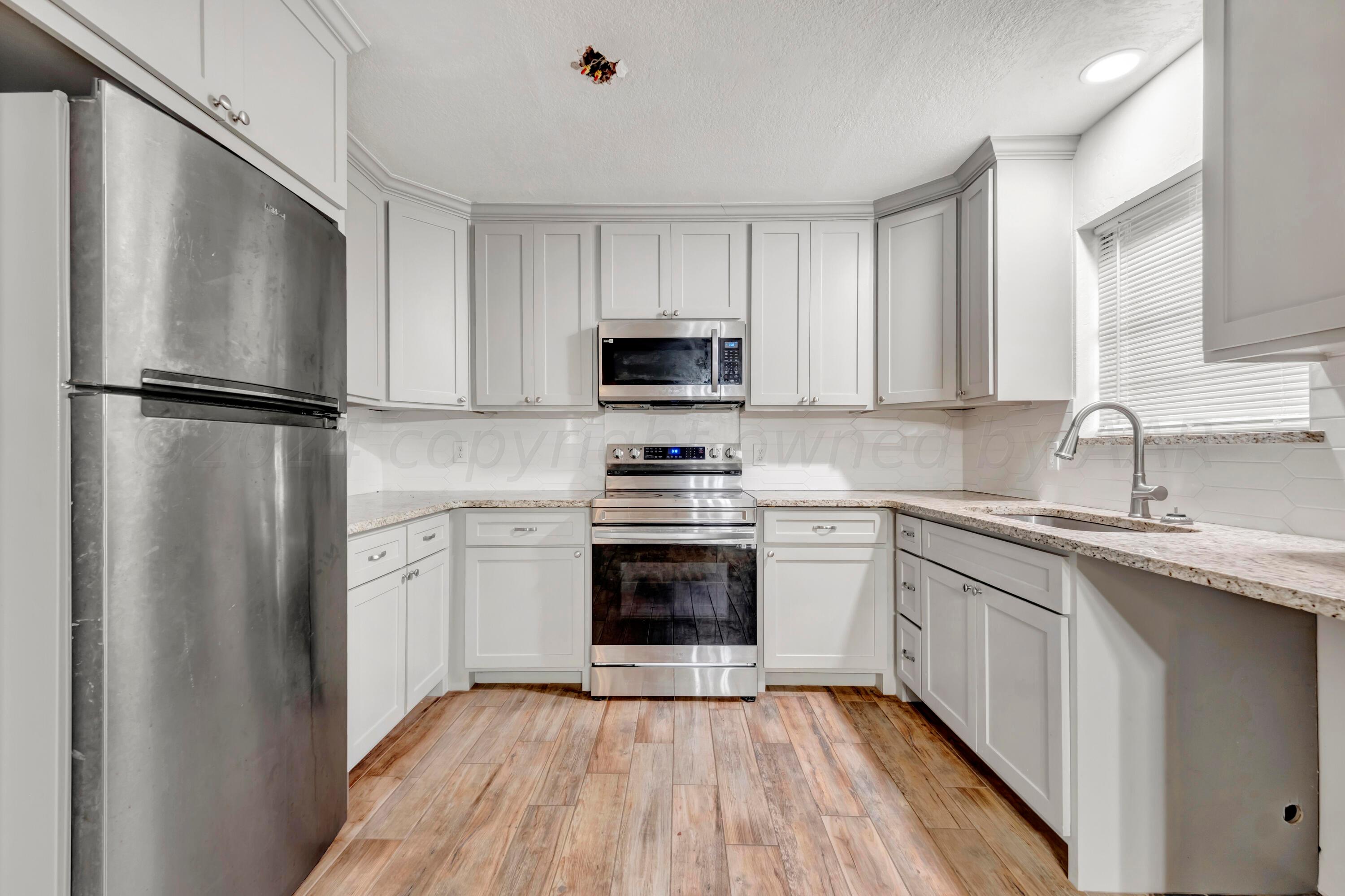 2913 Salem Drive Amarillo, TX 79110 - Photo 7 of 24 Kitchen - 1