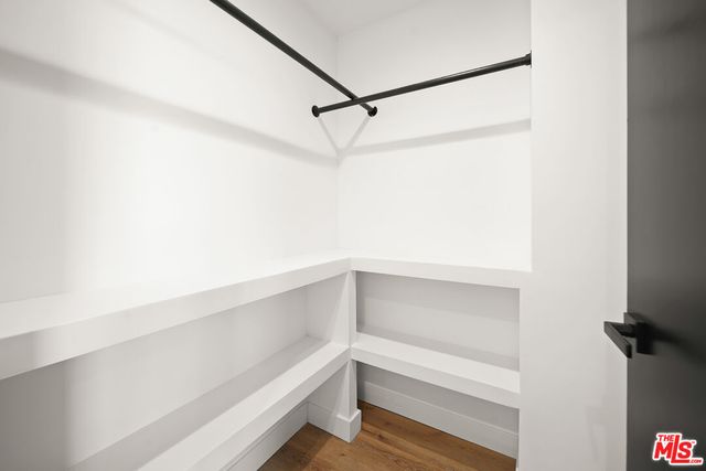 a view of an empty walk in closet