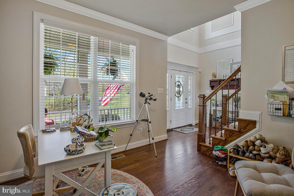 54 Simmons Ridge Road Prince Frederick, MD 20678 - Photo 8 of 55 a view of a livingroom with furniture and a window