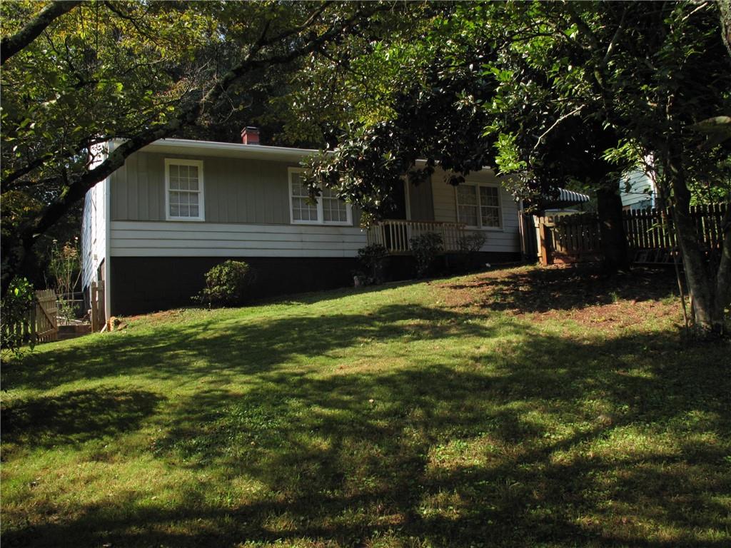 3393 Phillip Circle Decatur, GA 30032 - Photo 1 of 1 a house view with a garden space