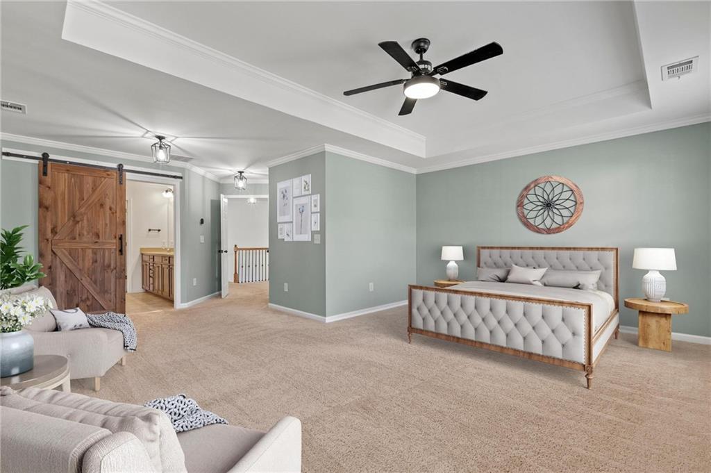 2615 Maple Leaf Terrace Cumming, GA 30041 - Photo 18 of 34 a living room with furniture and a chandelier