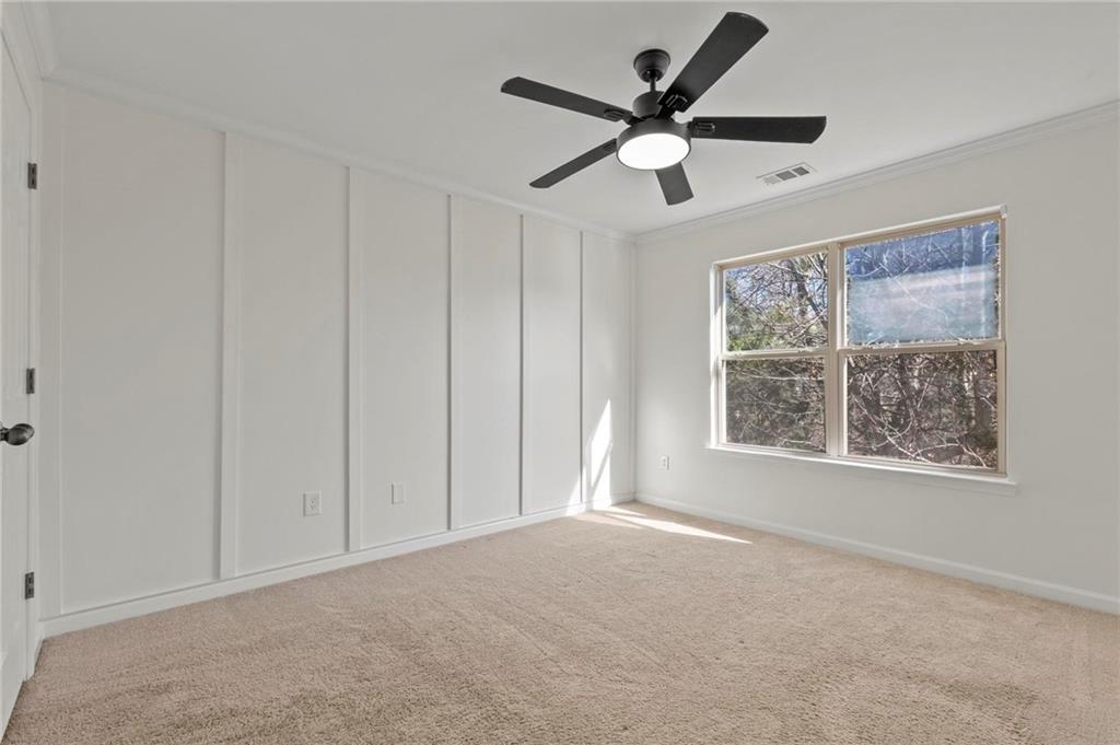 2615 Maple Leaf Terrace Cumming, GA 30041 - Photo 25 of 34 a view of an empty room with a window