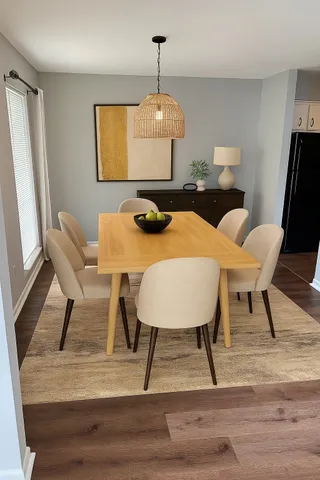 a view of a dining room with furniture
