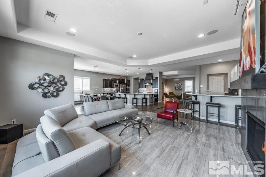 9826 Dyevera Lane Reno, NV 89521 - Photo 14 of 39 a living room with furniture and wooden floor