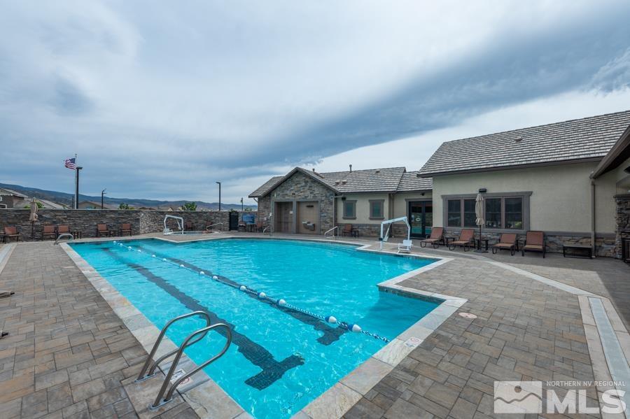 9826 Dyevera Lane Reno, NV 89521 - Photo 34 of 39 a view of a house with swimming pool and sitting area