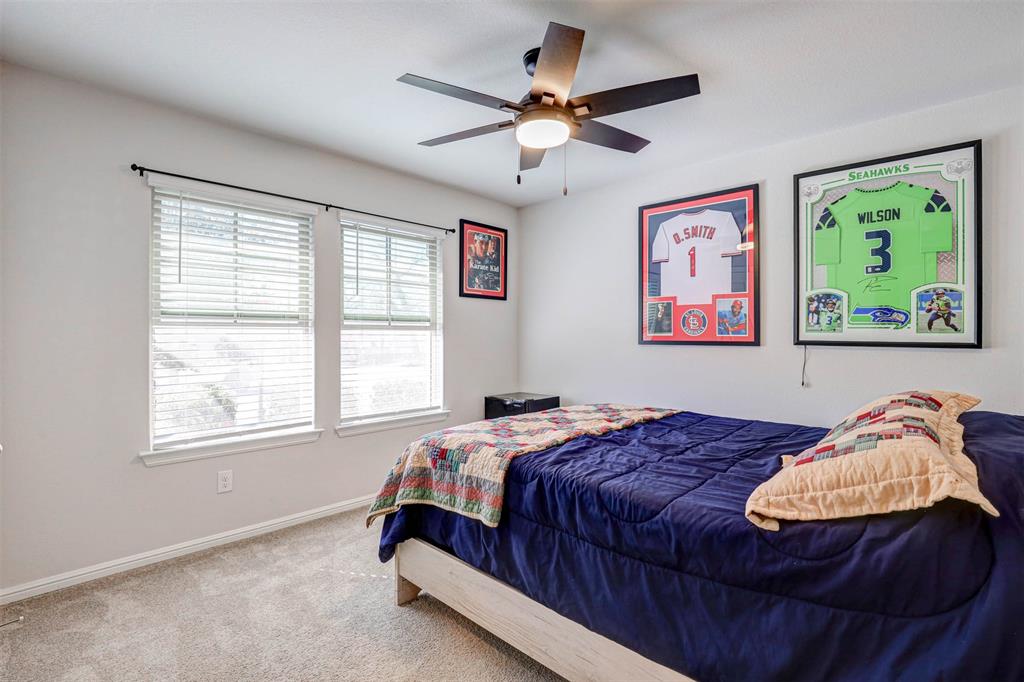 512 Amory Street Azle, TX 76020 - Photo 16 of 25 a bedroom with a bed and a window