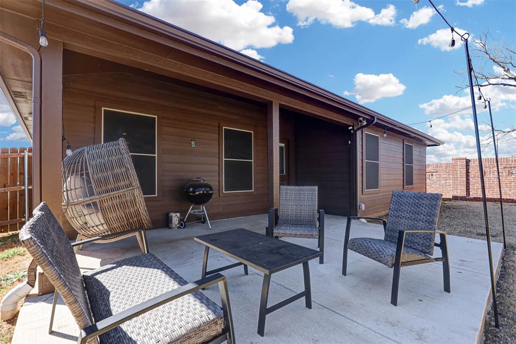 512 Amory Street Azle, TX 76020 - Photo 24 of 25 a outdoor seating area with furniture