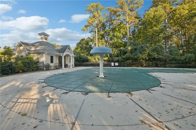 a front view of a house with yard