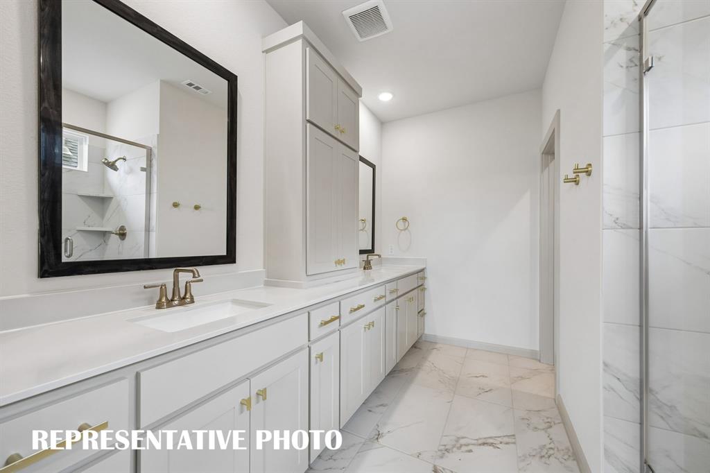 3775 Goddard Road McKinney, TX 75071 - Photo 12 of 20 Featuring fantastic storage and dual vanities, this owner's bath offers ample room for two! REPRESENTATIVE PHOTO