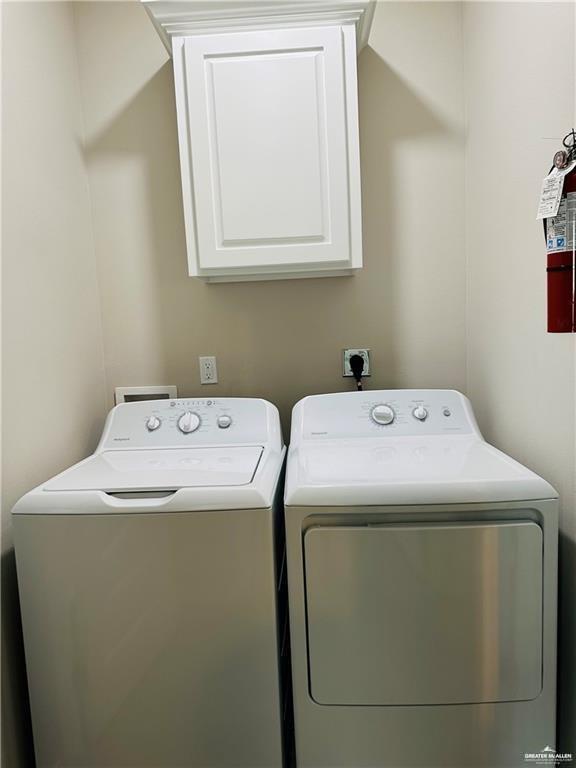 1614 Playa Drive, Unit 3 Weslaco, TX 78596 - Photo 9 of 11 a utility room with dryer and washer