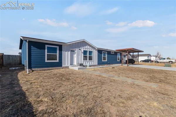 a house view with a garden space