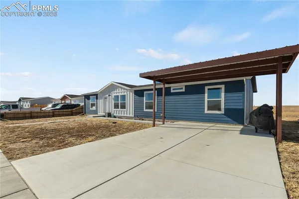 a house view with a outdoor space