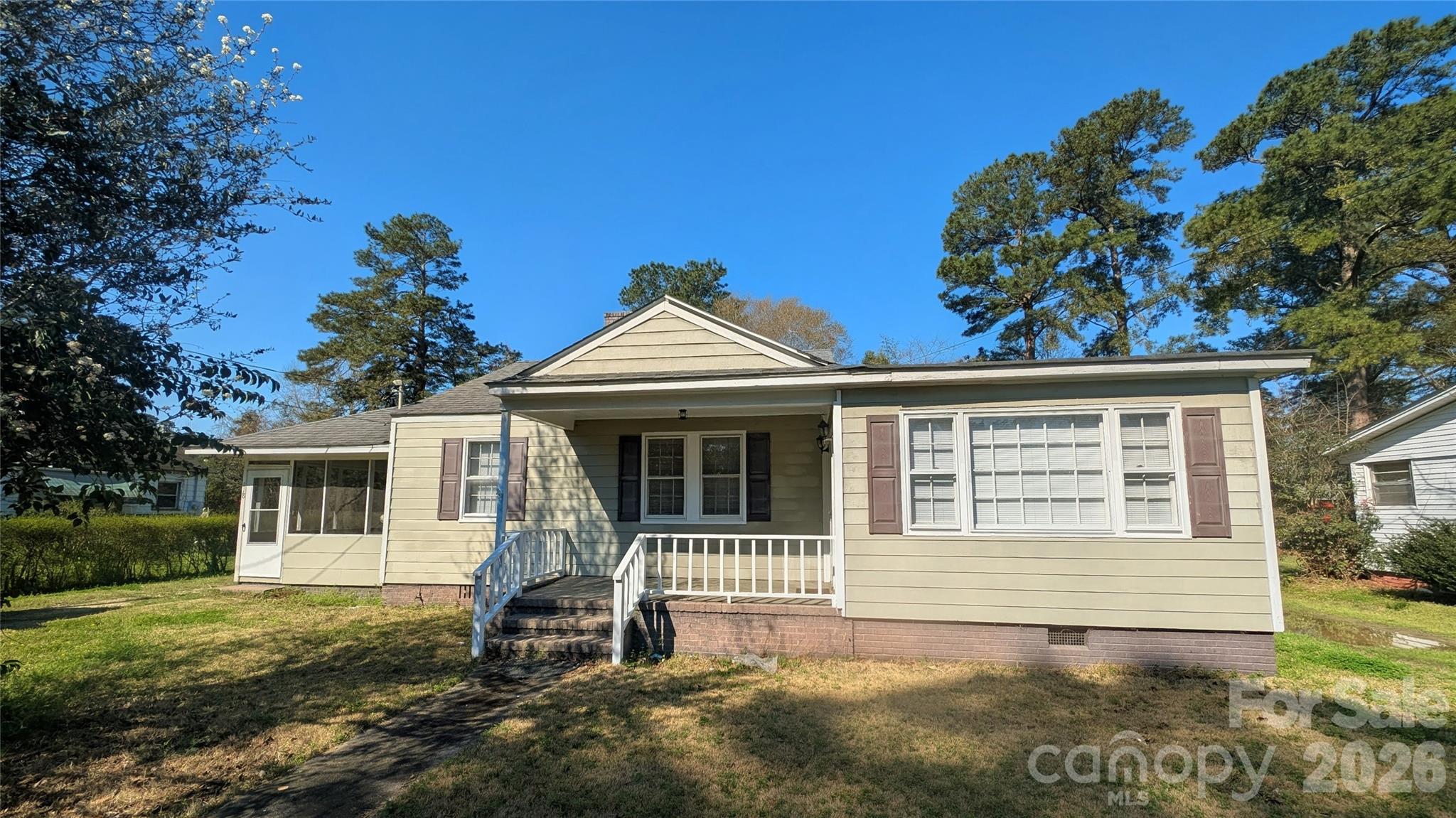 118 Brown Street Lake City, SC 29560 - Photo 12 of 12 a view of a house with a yard