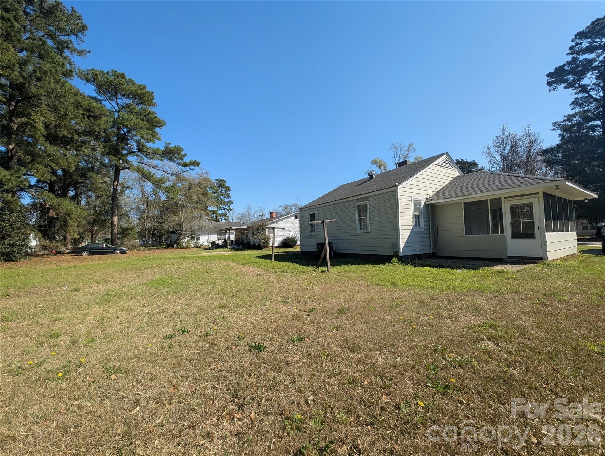 118 Brown Street Lake City, SC 29560 - Photo 10 of 12 a view of a house with a backyard