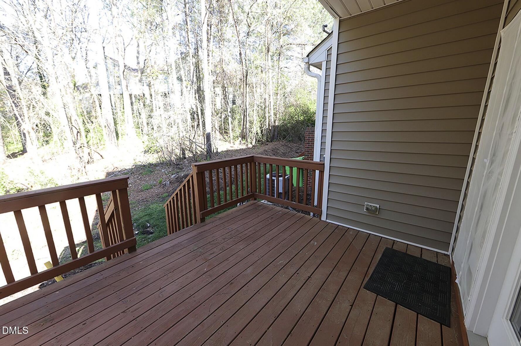 5947 Four Townes Lane Raleigh, NC 27616 - Photo 12 of 13 a view of backyard with a deck