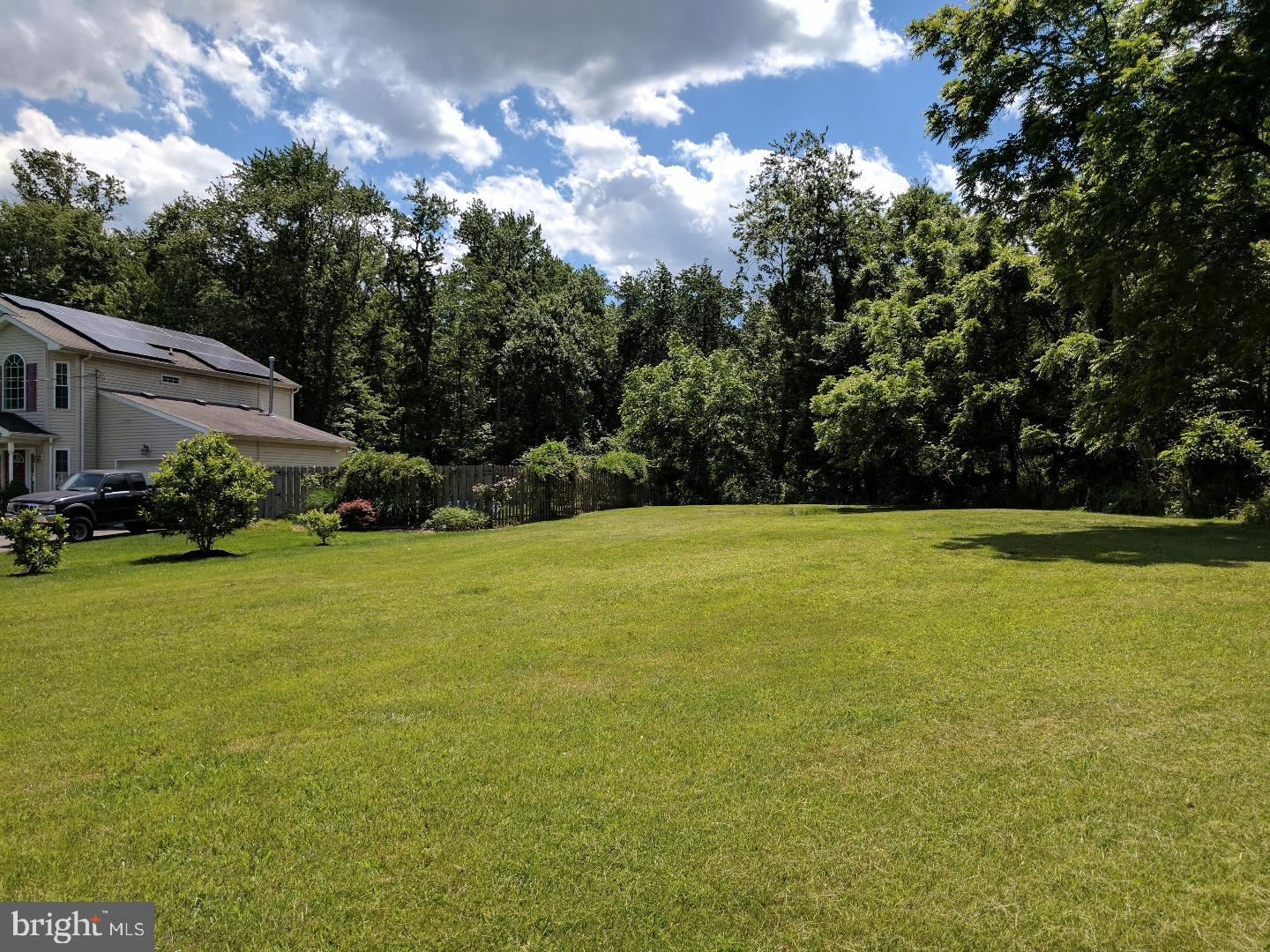 154 B Franklyn Road Ewing, NJ 08628 - Photo 2 of 4 a view of green field with house in the background