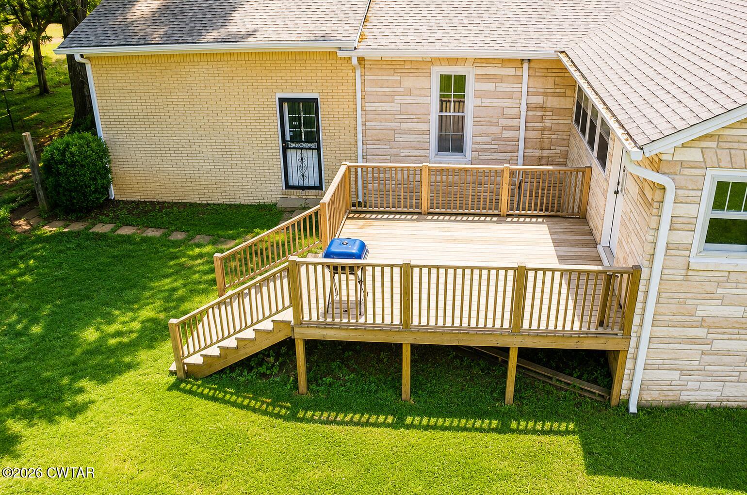 2800 Locust Grove Road Newbern, TN 38059 - Photo 44 of 46 a view of a house with a deck