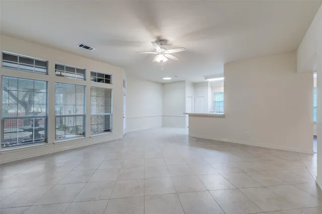 a view of a house with chair and sitting area