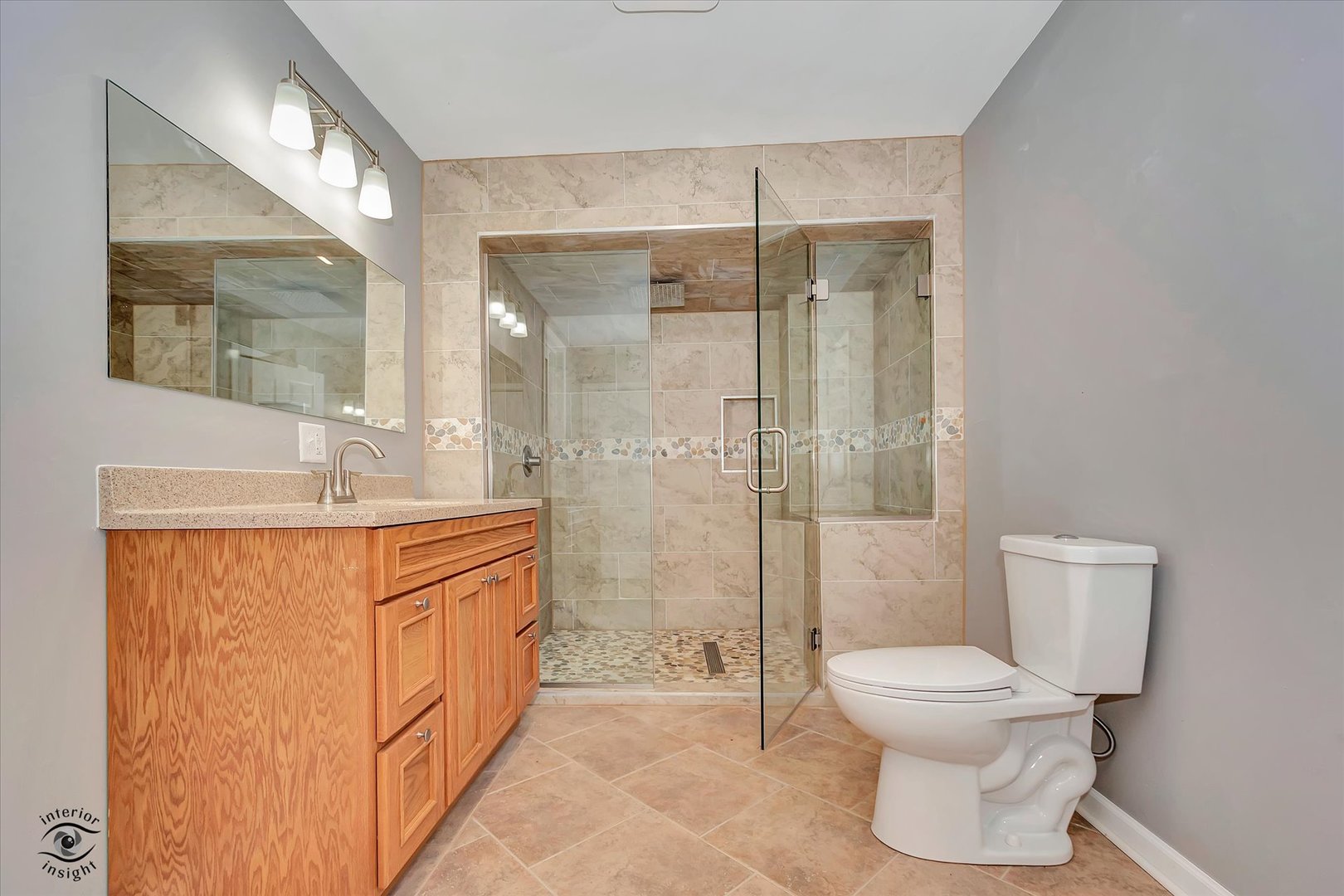 1032 South E Avenue Kankakee, IL 60901 - Photo 14 of 29 a bathroom with a granite countertop sink toilet and shower