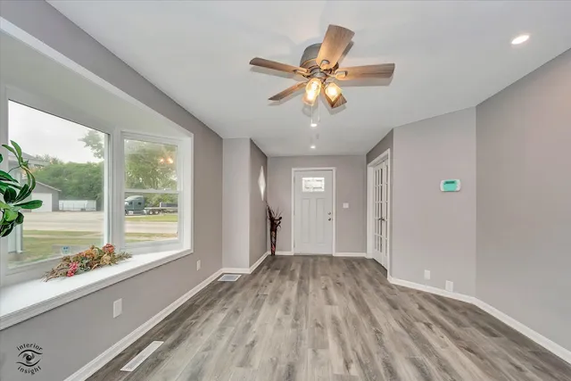a view of an empty room and window