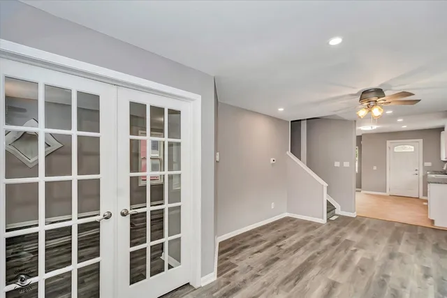 a view of a livingroom with a staircase