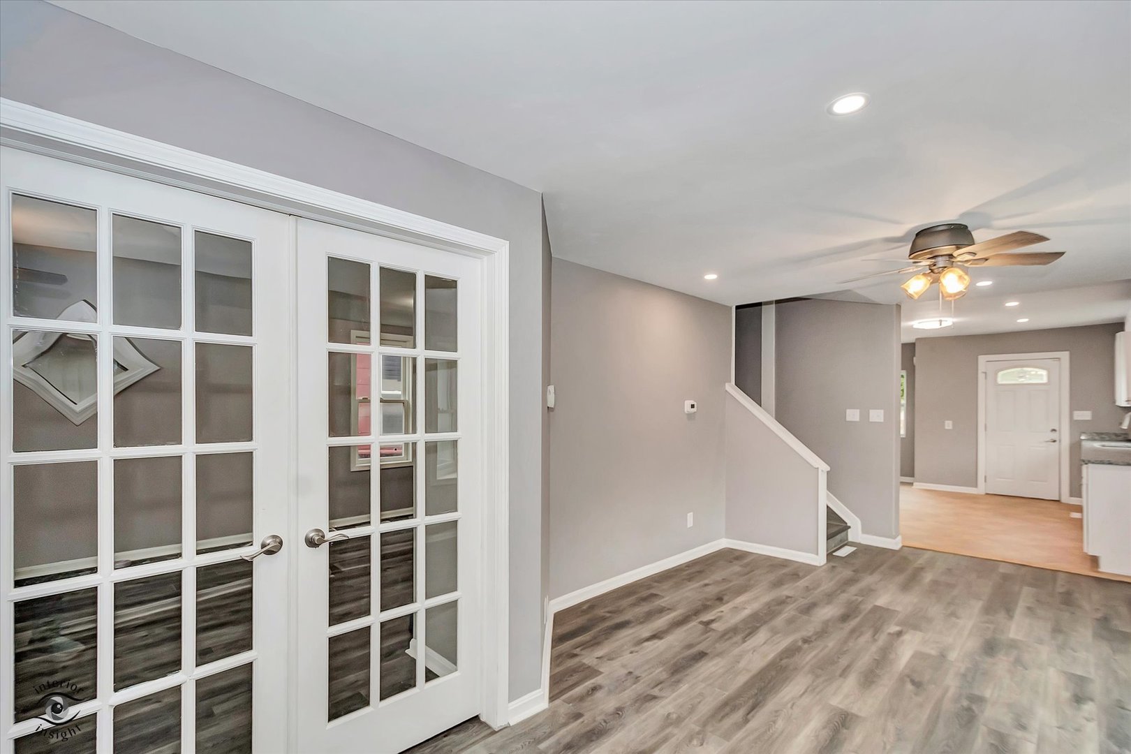 1032 South E Avenue Kankakee, IL 60901 - Photo 5 of 29 a view of a livingroom with a staircase