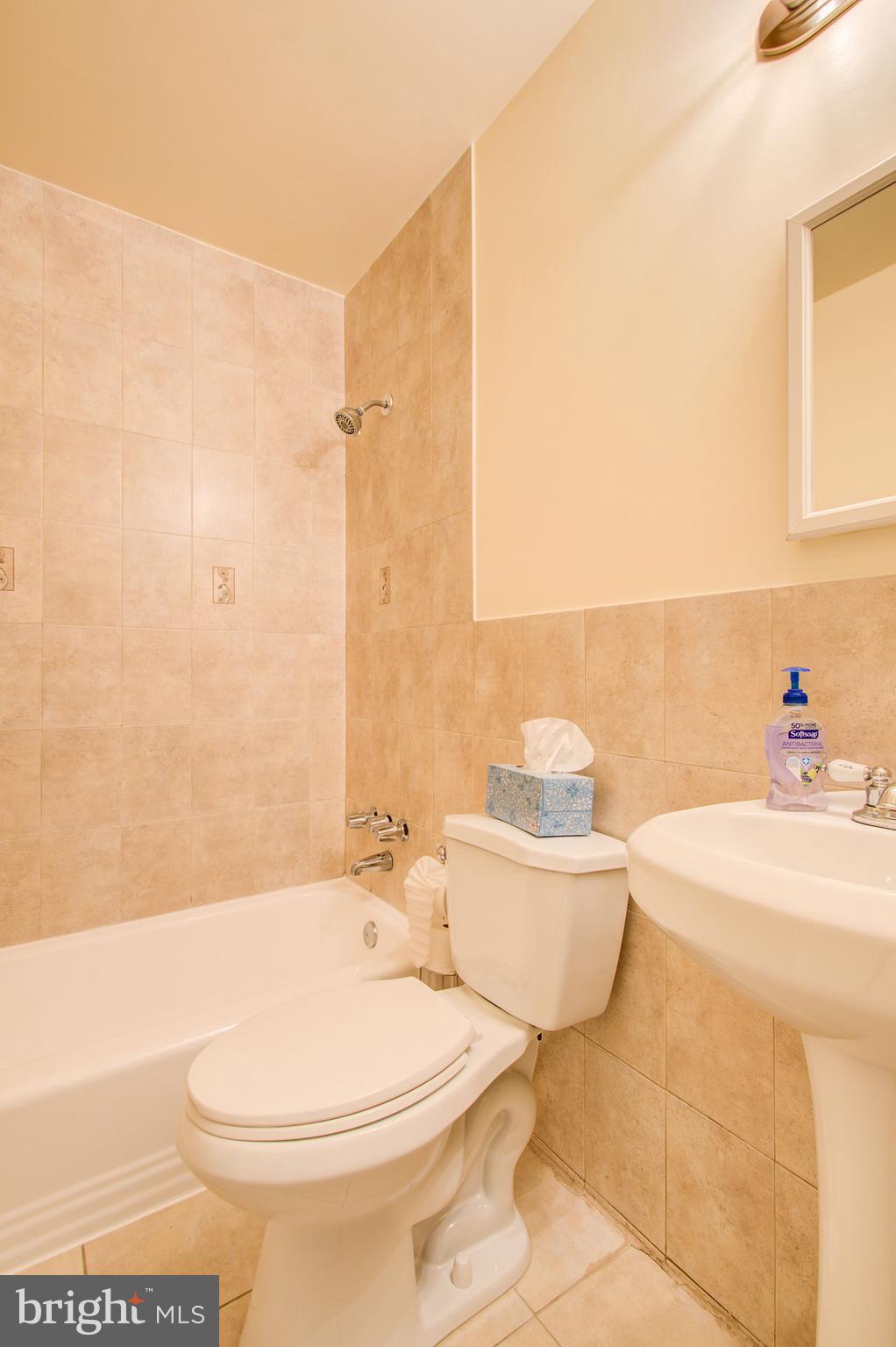 10604 Woodsdale Drive Silver Spring, MD 20901 - Photo 13 of 30 Main level update full bath.